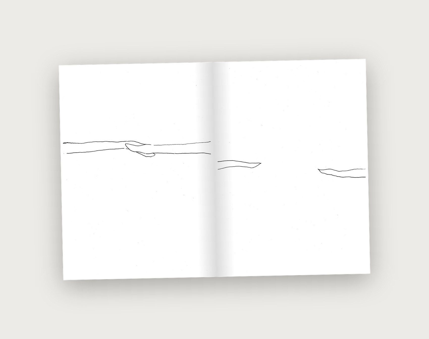 Dichotomy zine closing spread with faint, drifting-apart marks